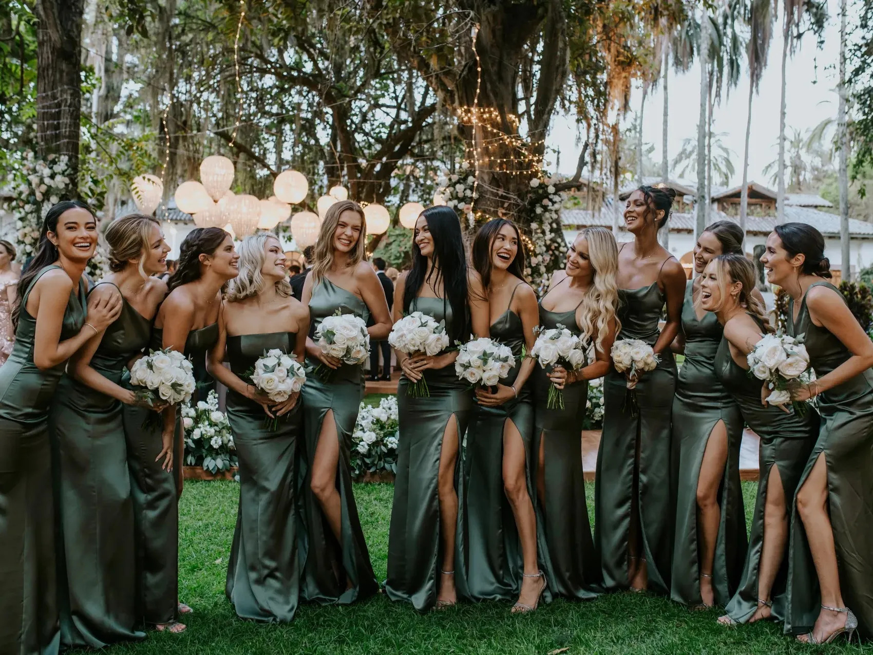 Bridesmaids in their bridesmaid dresses with different designs