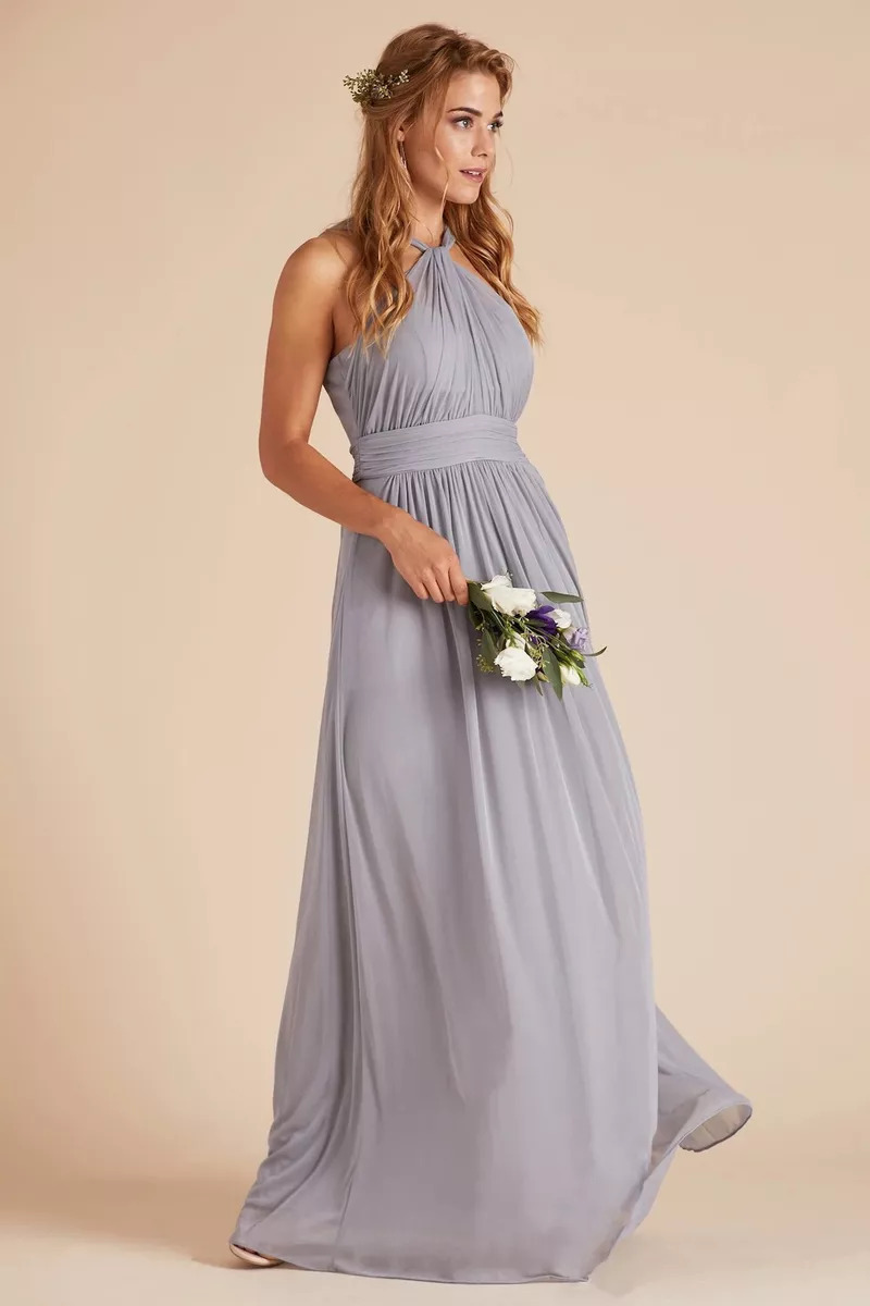 A Bridesmaid Wearing A Birdy Grey Halter-Neck Dress And Holding A Bouquet