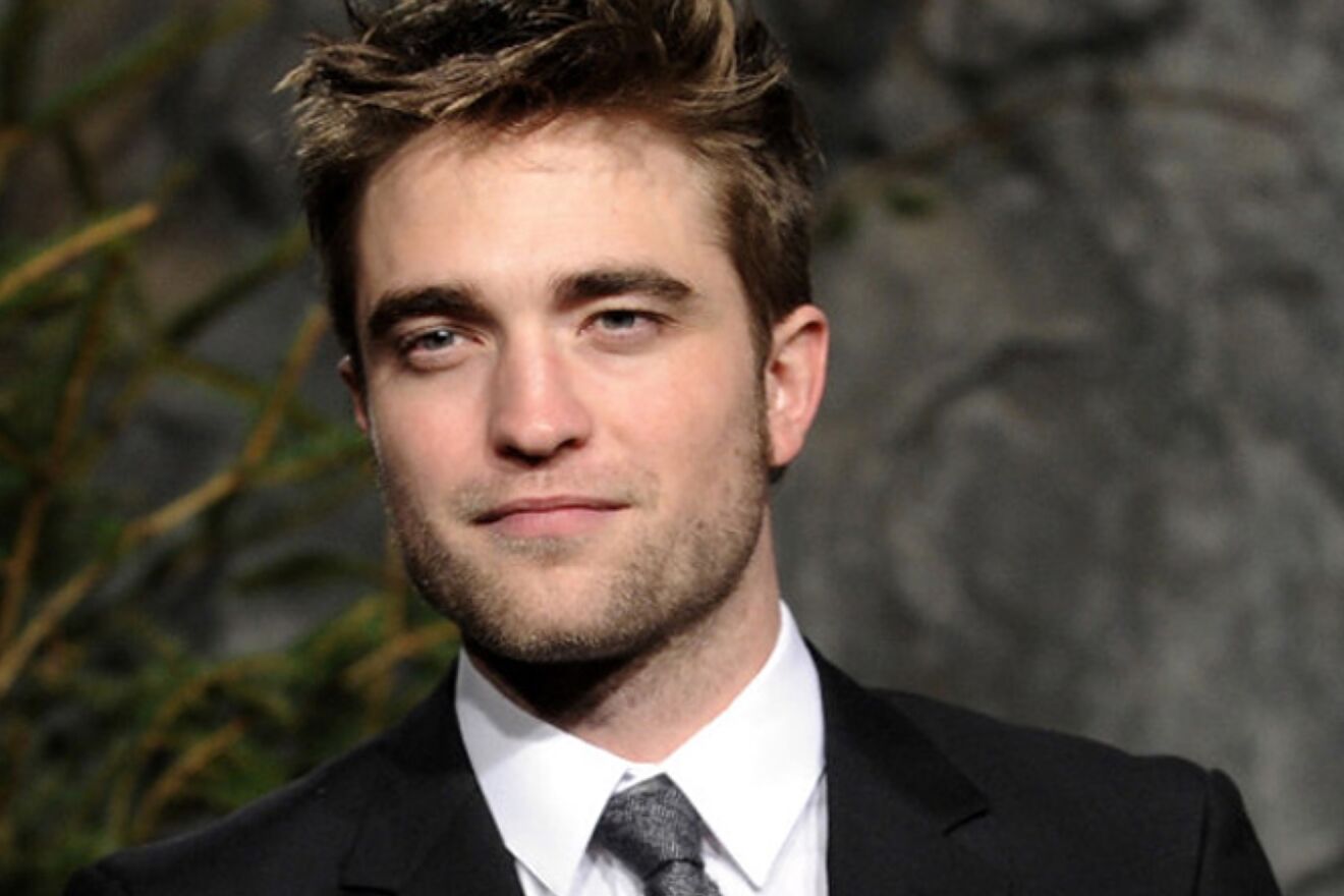 Robert Pattinson wearing a black suit