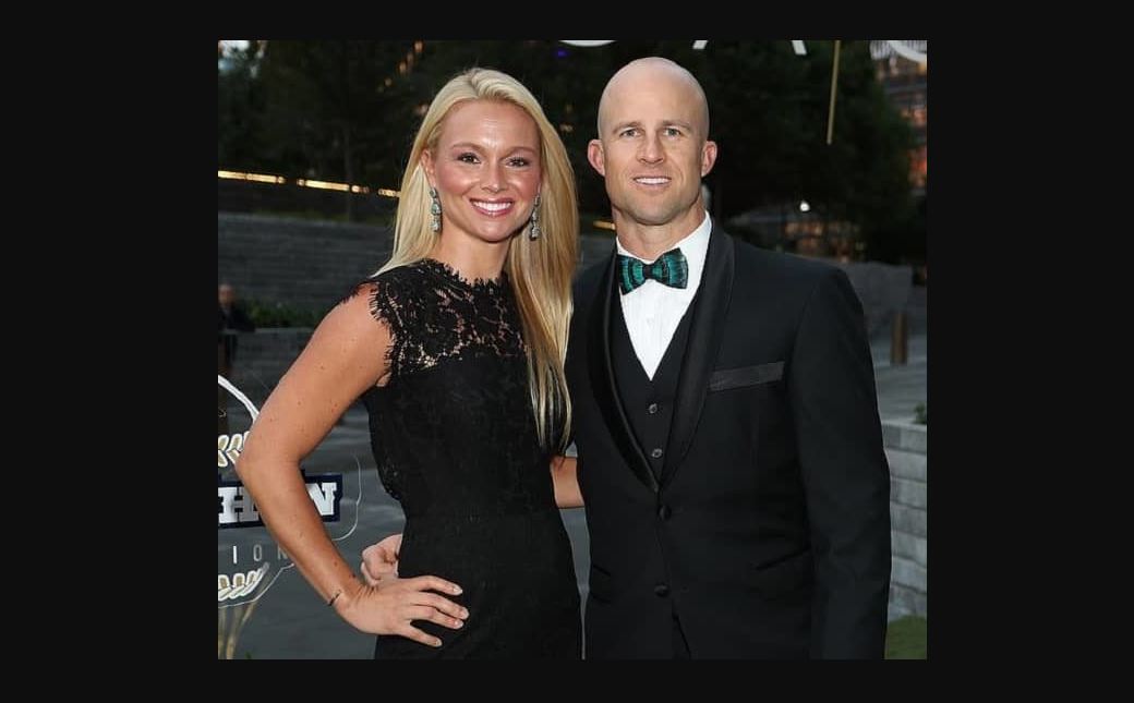 Jessica Clendenin with her husband at an event with smiles on their faces