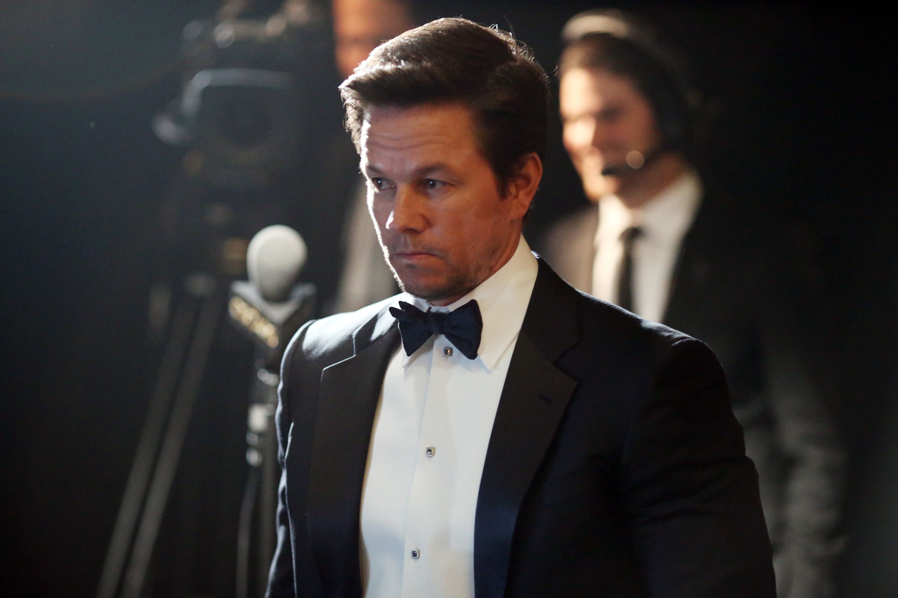 Mark Wahlberg wearng a black suit
