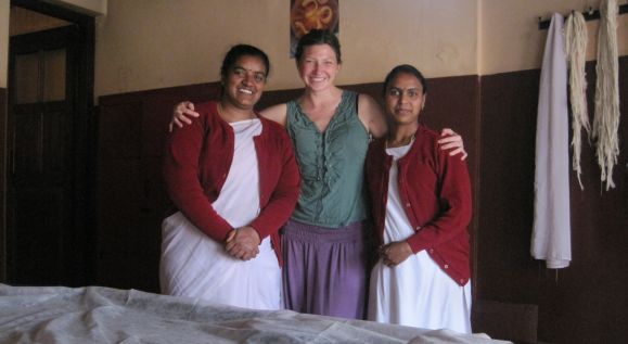 Dr. Kyle Willets, together with two therapeutic yoga instructors and all smiling