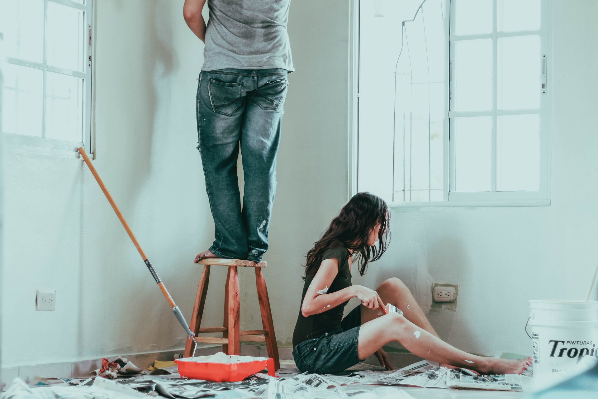 A young couple used the money they got from personal loan providers to repaint their apartment