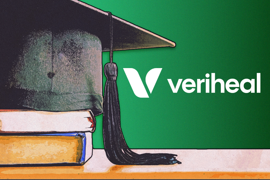 Veriheal logo beside a graduation cap on top of two books.