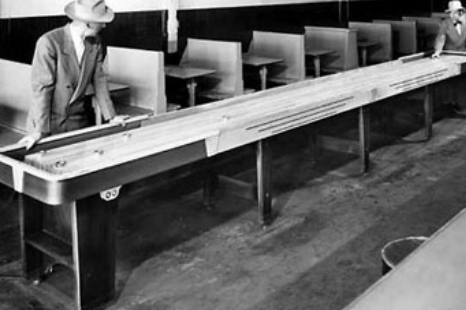 A rare photograph of a lengthy shuffleboard table from the 1990s