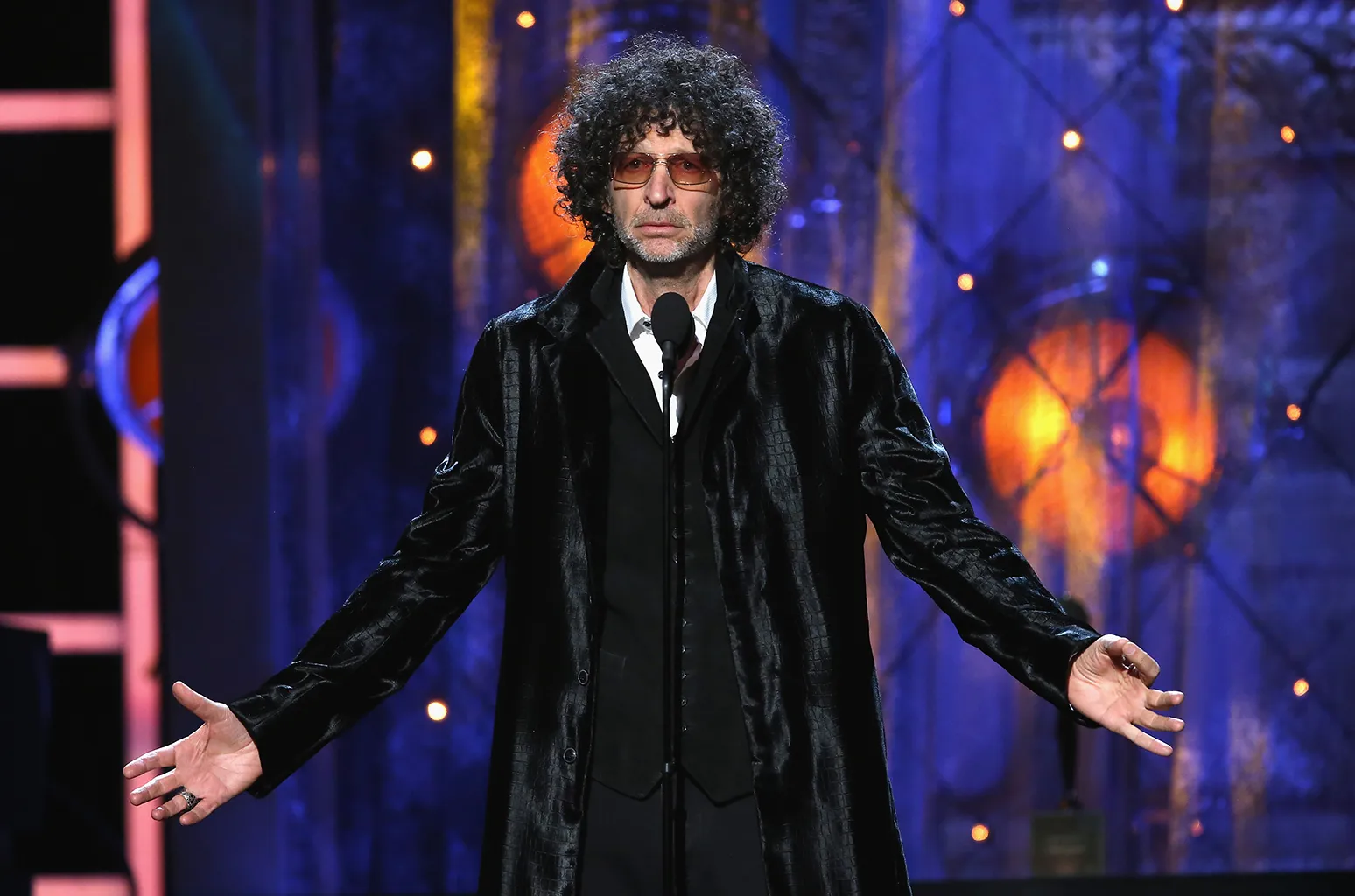 Howard stern doing his show, performing on stage