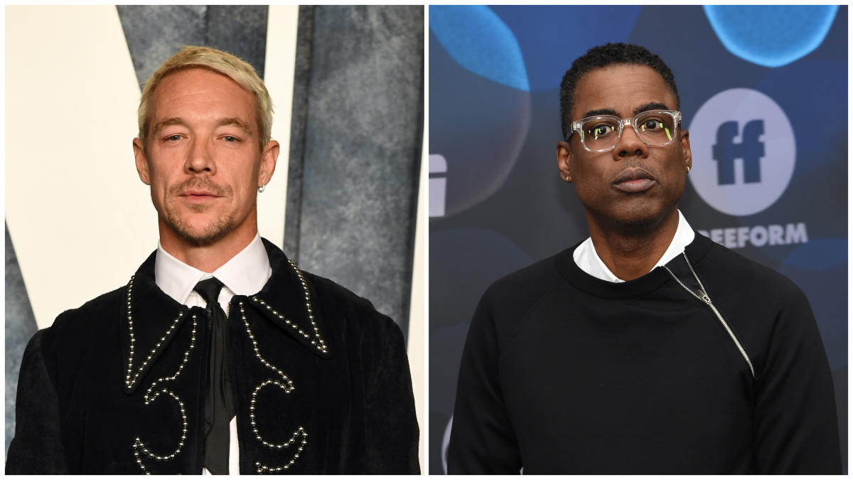 Diplo wearing a black coat and Chris Rock wearing a black sweater