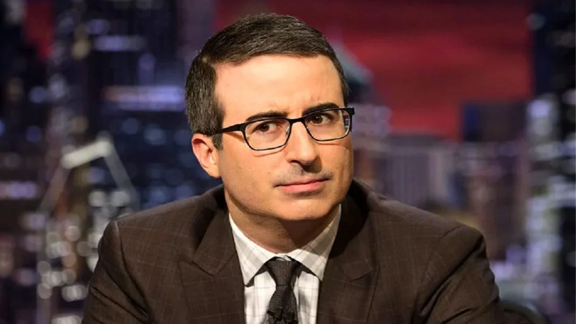 John Oliver Sitting In An Interview