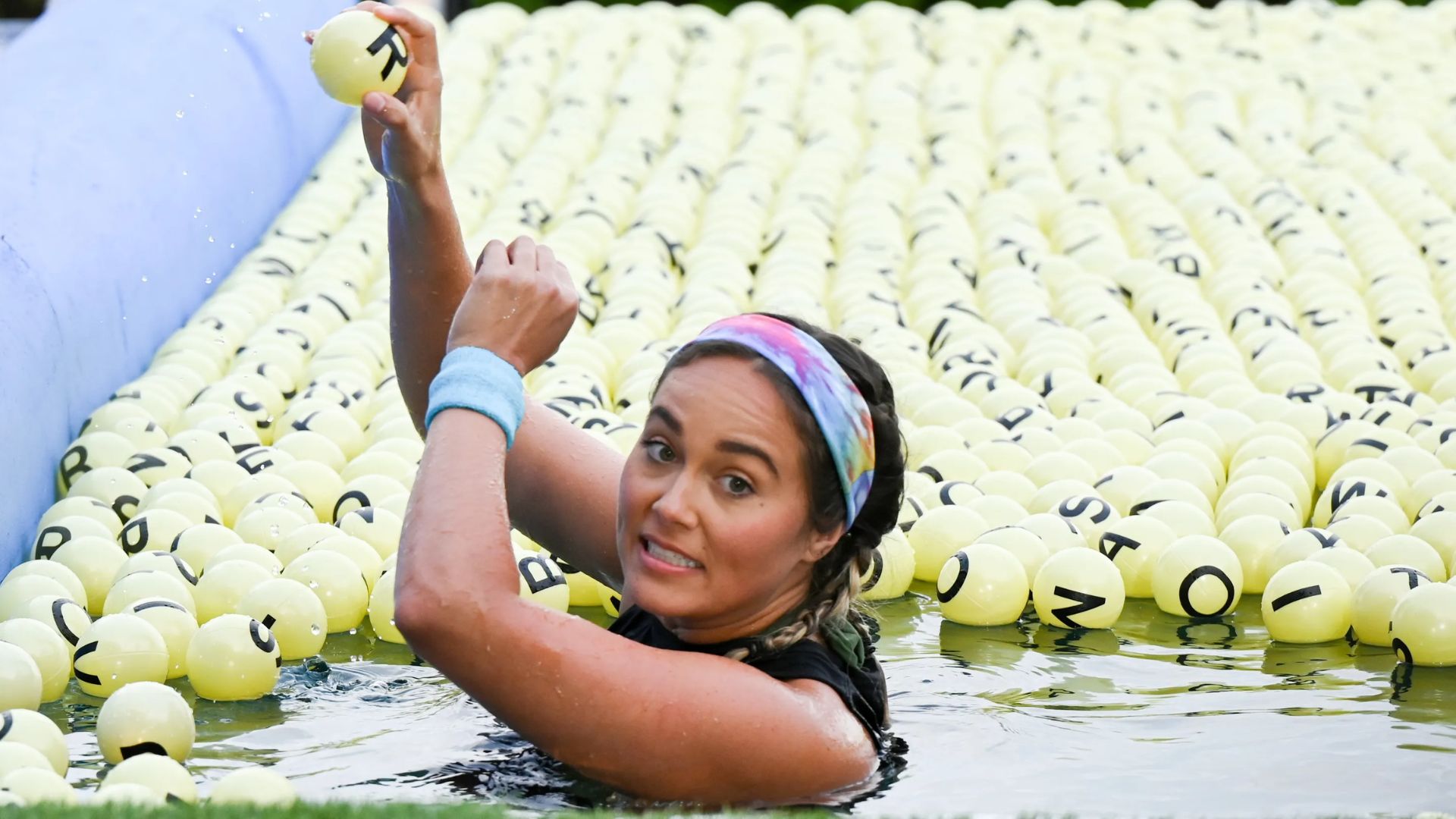  Brittany Favre in a pool with Balls