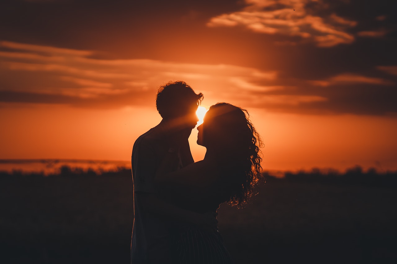 Silhouette of Man and Woman at sunset