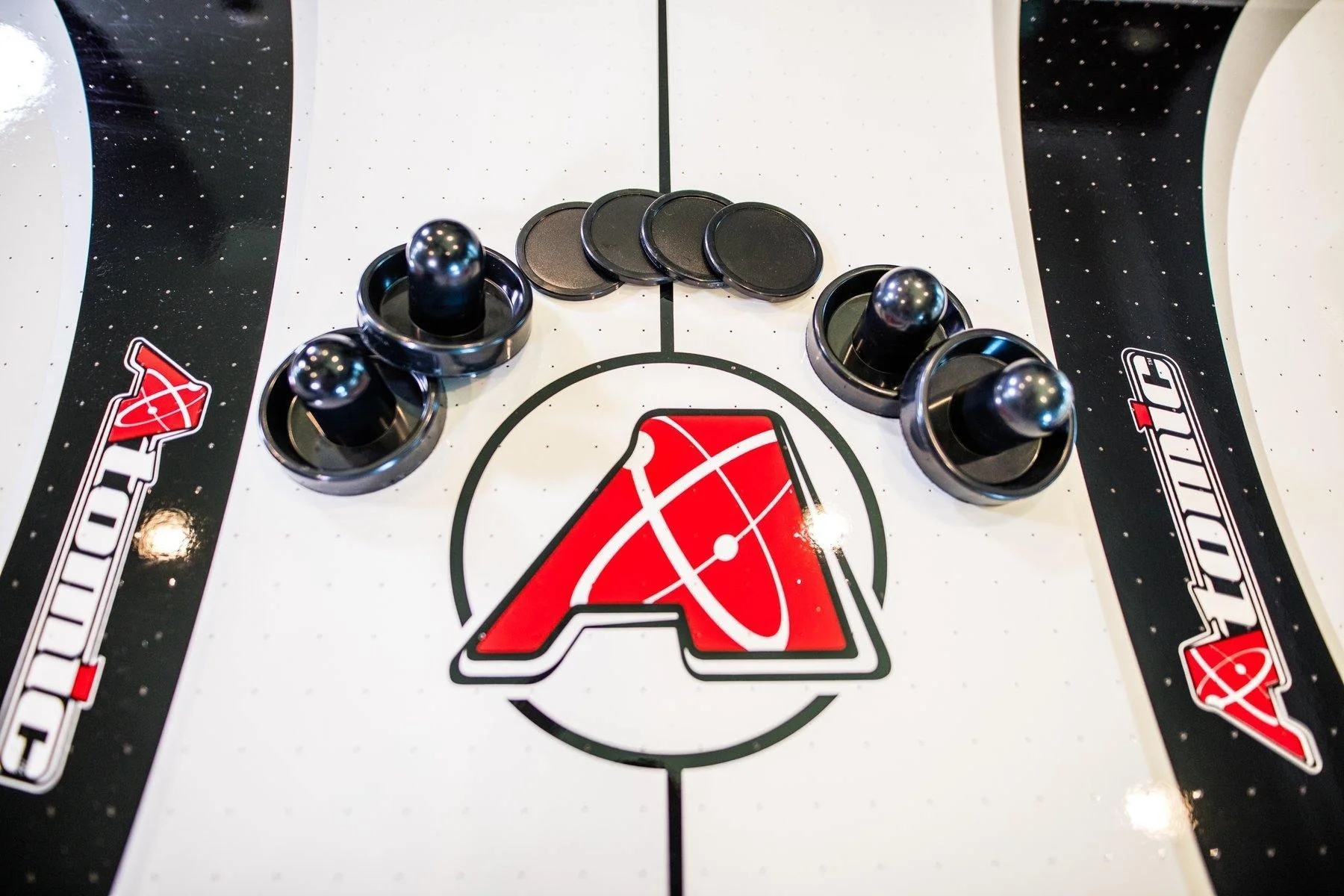 Playing surface of the Atomic Blazer 7' Air Hockey Table