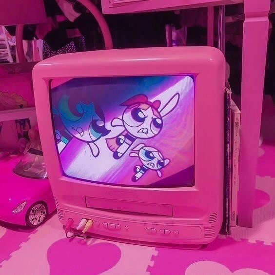 Cartoon telecast on pink tv along everything in pink colour