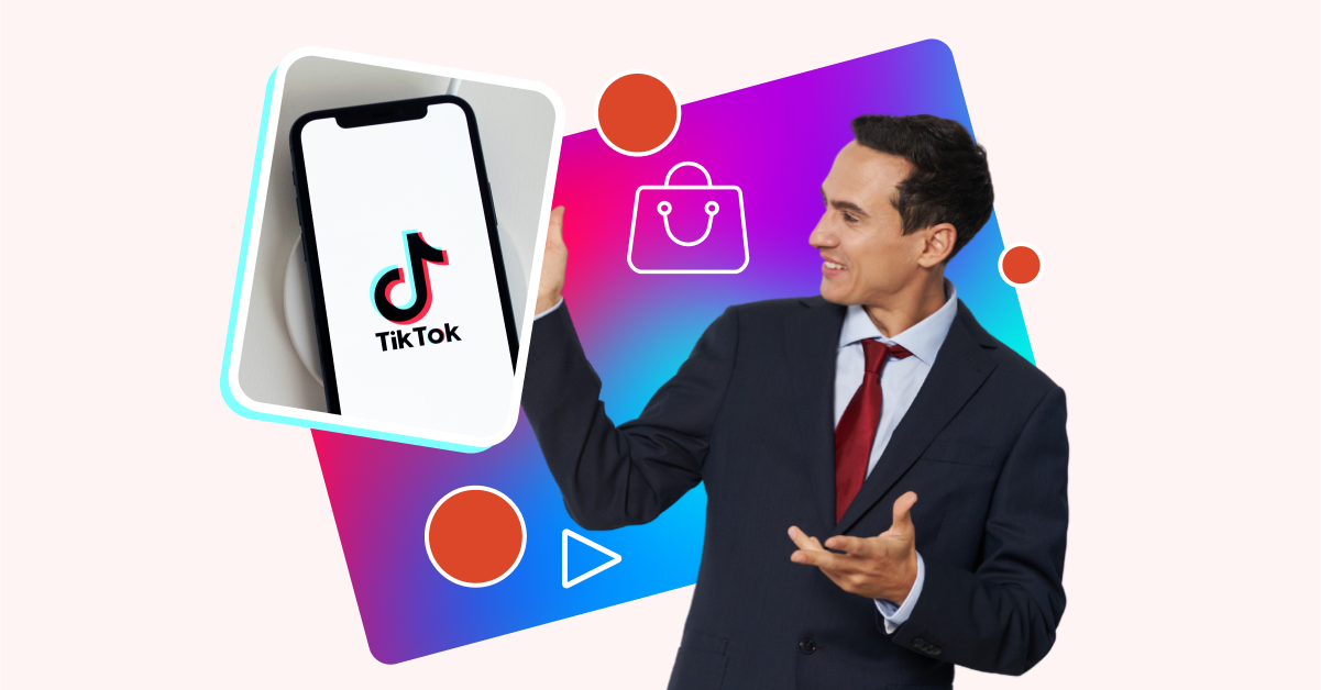 A man in a suit enthusiastically presents a smartphone displaying the TikTok logo against a colorful abstract background.