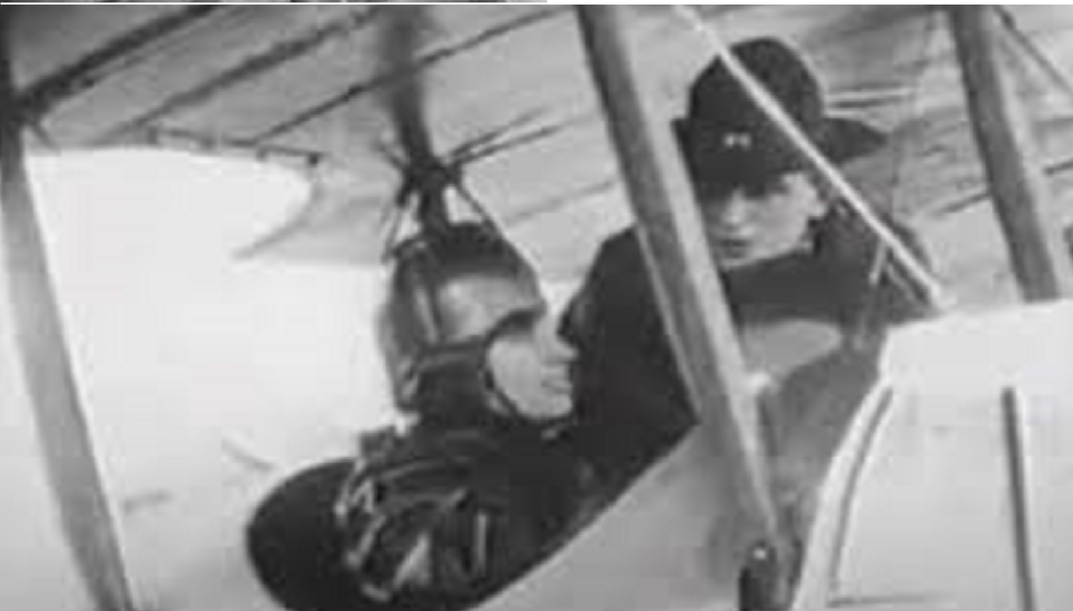 Black and white image of helen keller flying a plane