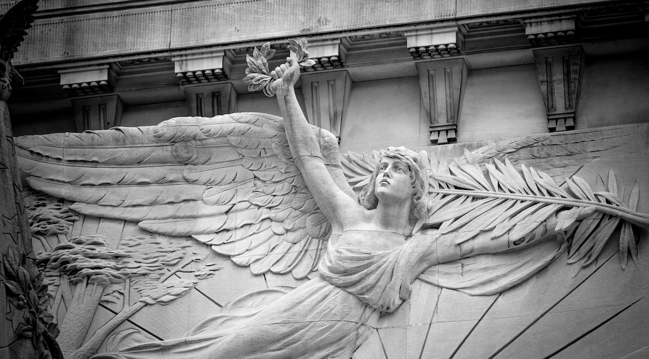 Grayscale of Angel Sculpture