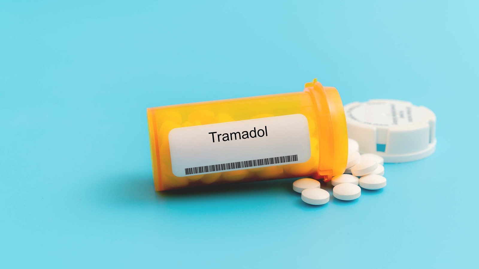 Tablets coming out of tramadol bottle