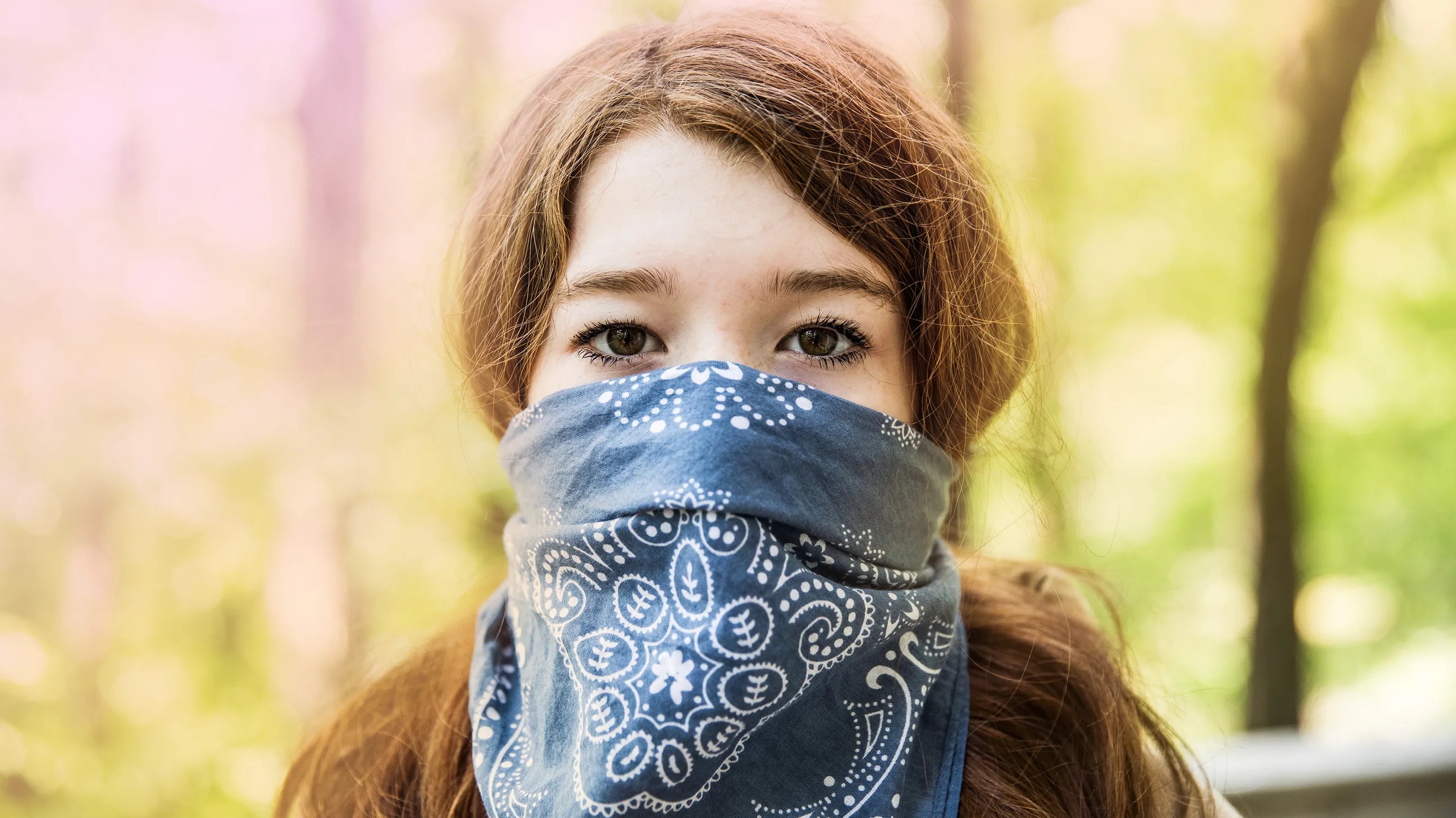 A girl wearing bandana as a face mask