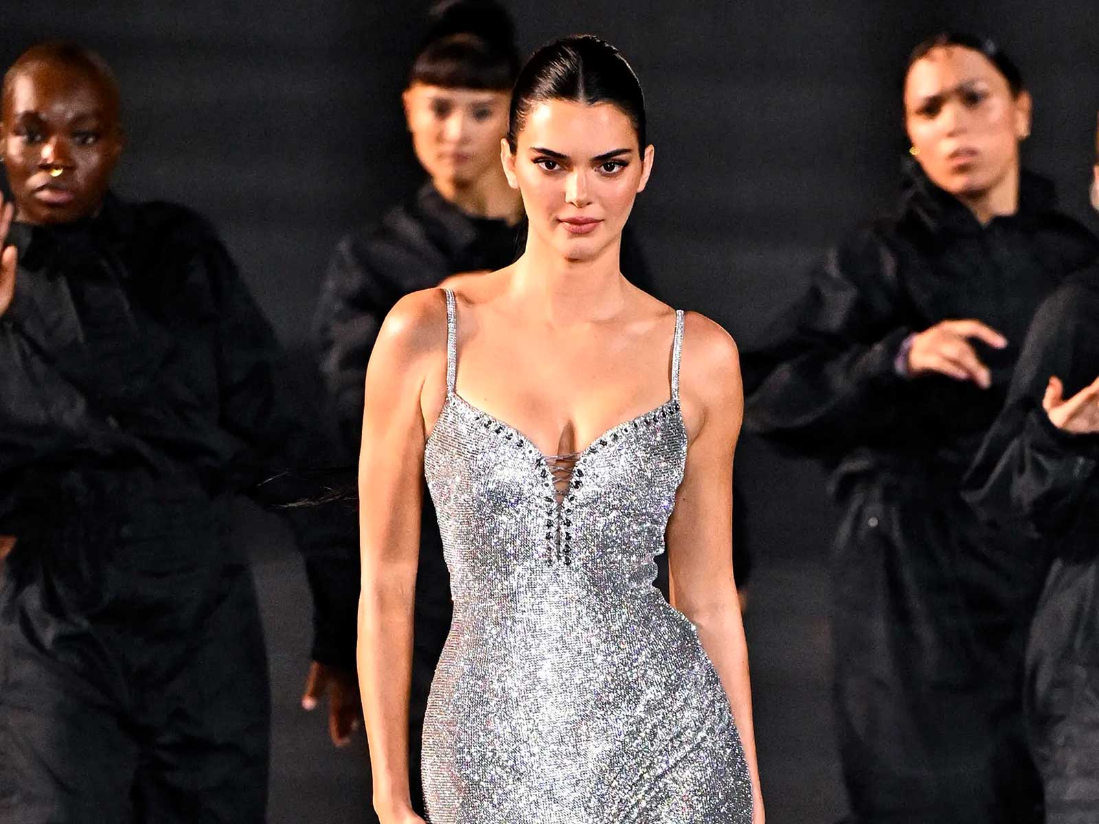 Kendall Jenner wearing a silver dress