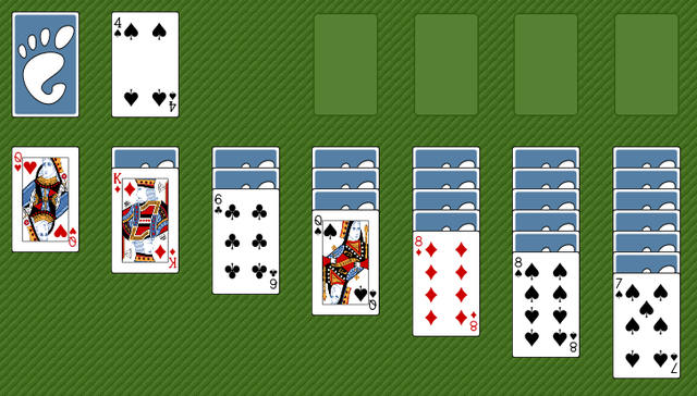 A solitaire card game layout with a paw print icon on the top left corner, set against a textured green background.