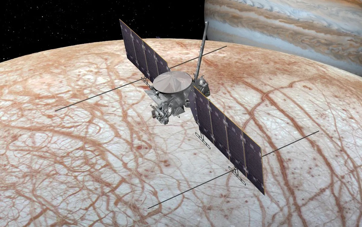Illustration of what the Europa Clipper spacecraft will look like flying by Europa, a moon of Jupiter