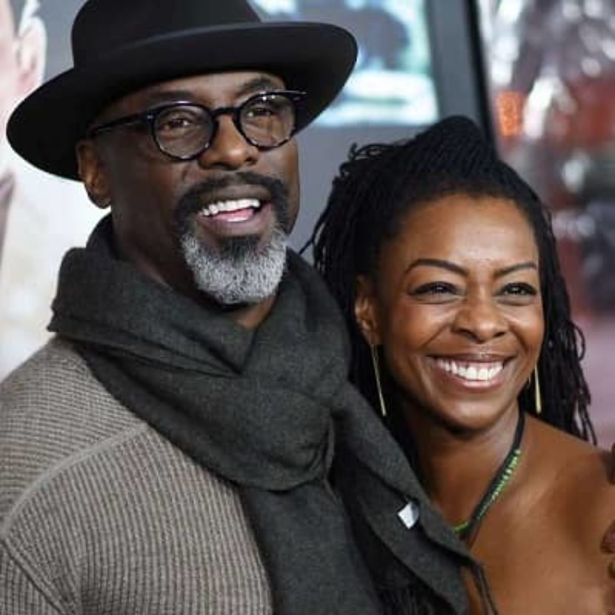 Isaiah Washington standing with his wife