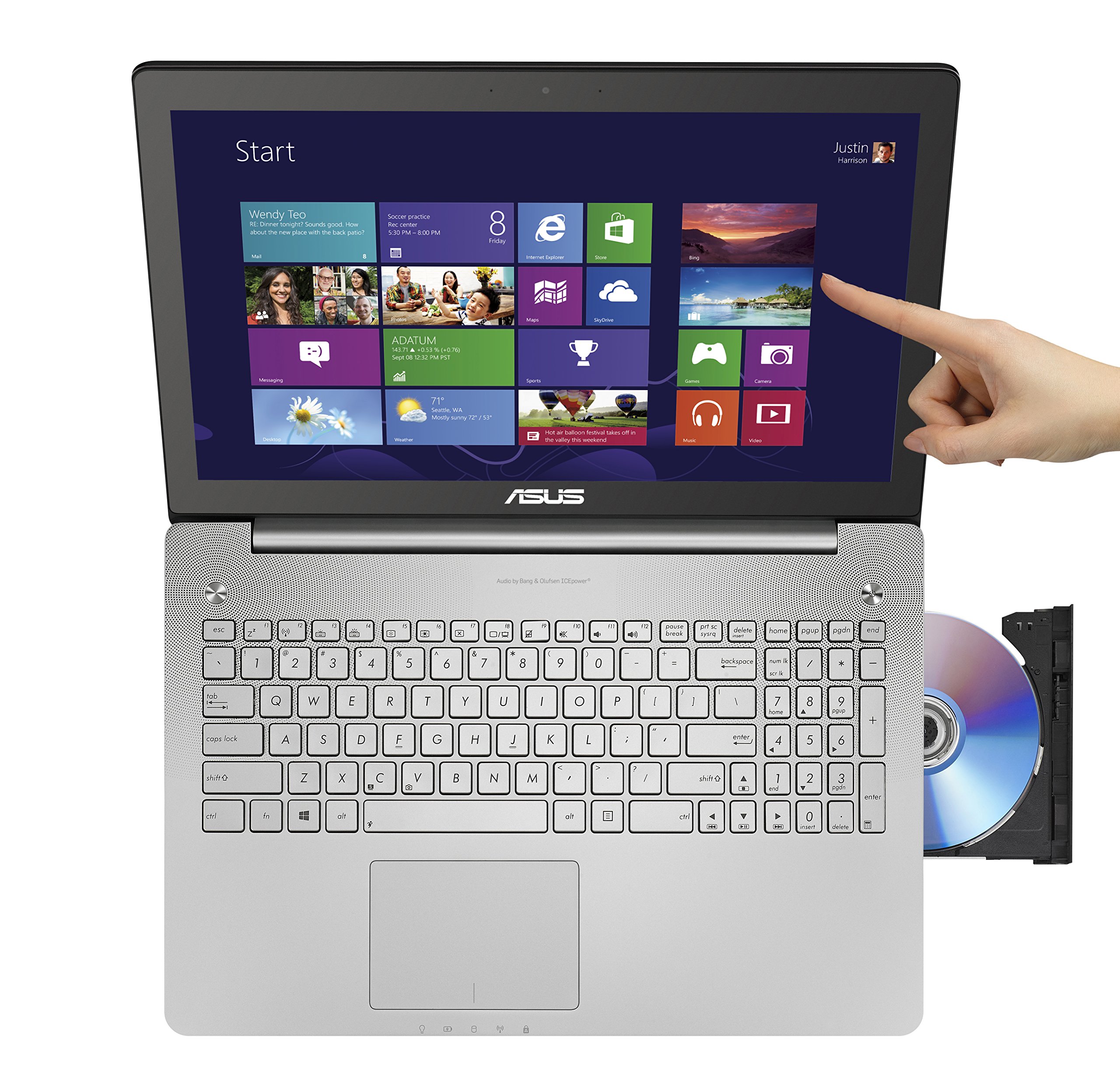 A hand pointing towards the asus laptop 