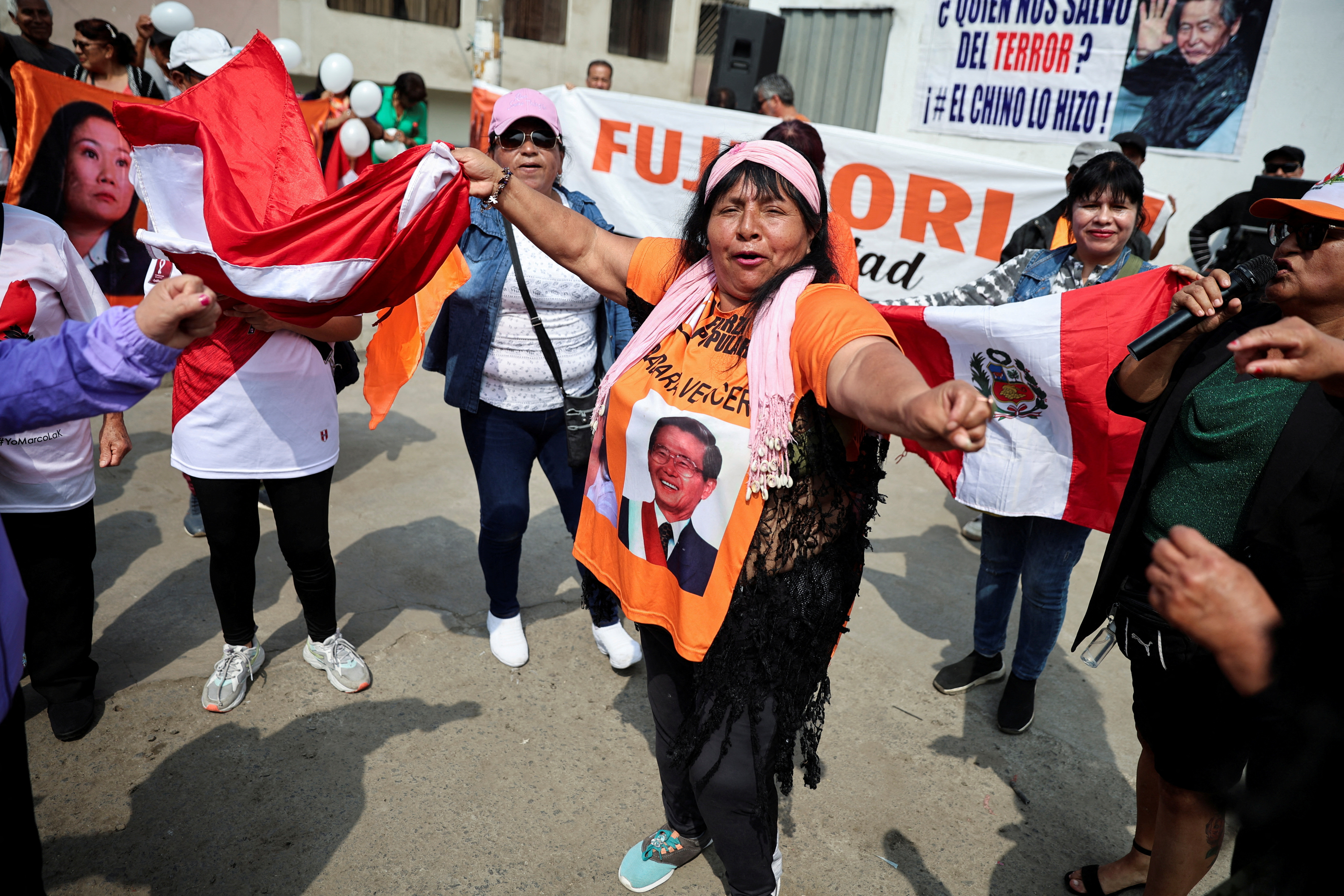 People protest outside the prison where Peru's former President Alberto Fujimori is being held, in Lima, Peru December 6, 2023.