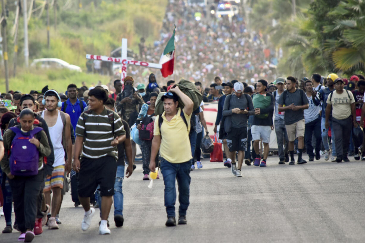 Migrant Caravan In Southern Mexico walking together
