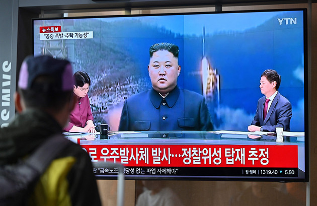 Footage of North Korean leader Kim Jong Un is seen on TV at the Seoul Railway Station in Seoul on May 31, 2023.