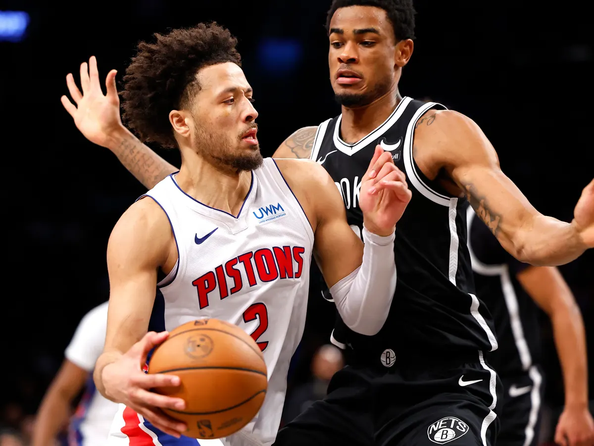 Detroit Pistons guard Cade Cunningham (2) drives to the basket against Brooklyn Nets center Nic Claxton during the second half of Saturday’s game.