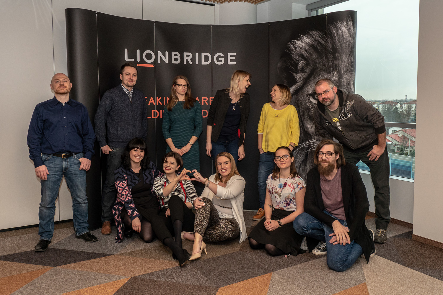 Lionbridge employees posing for group photo