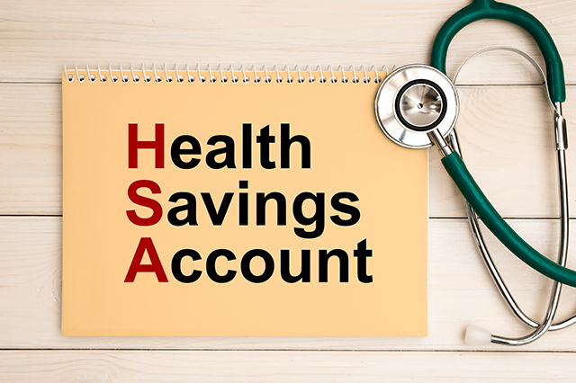 Notepad with "Health Savings Account" title and stethoscope