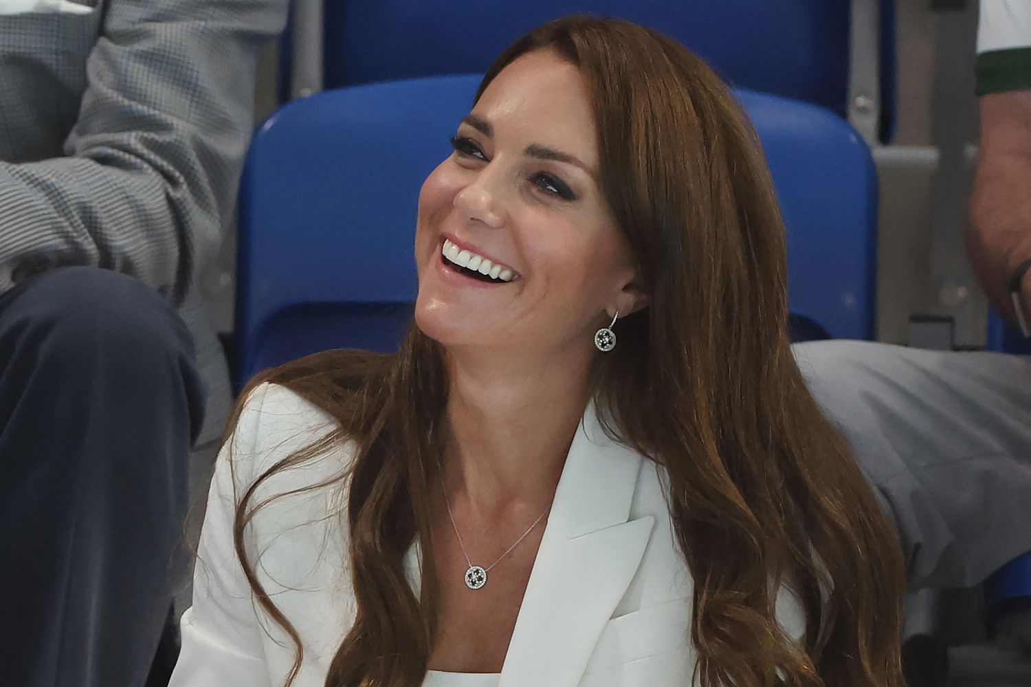 Kate Middleton wearing a white coat