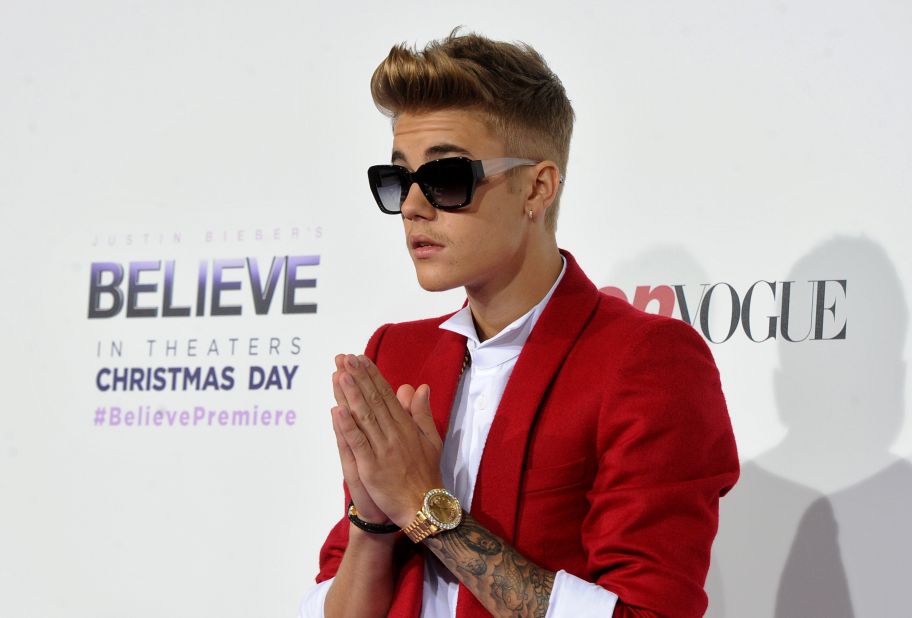 Justin Bieber wearing a red suit