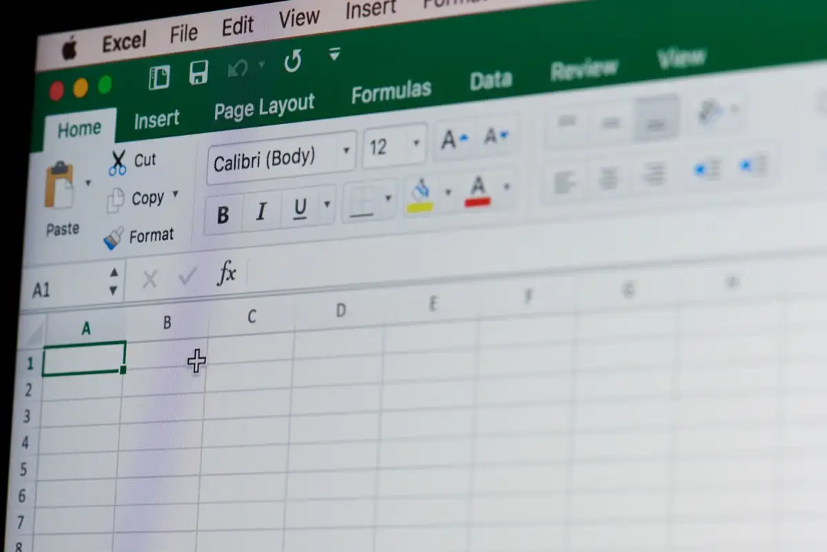 Microsoft Excel open on a computer screen, focusing on the Home tab of the ribbon interface.