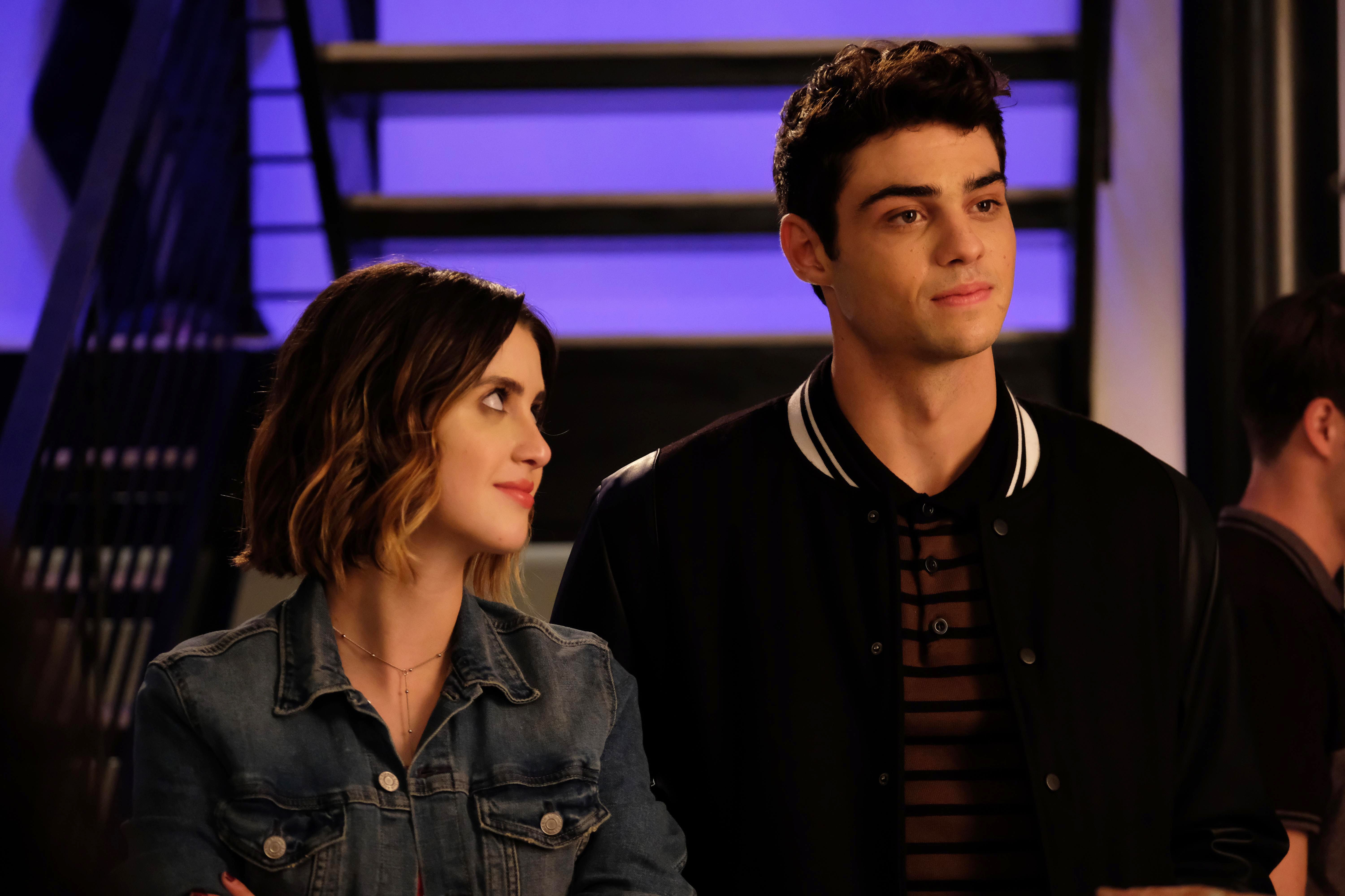 Laura Marano wears a beautiful jean jacket in The perfect Date while Reuniting with Noah Centineo