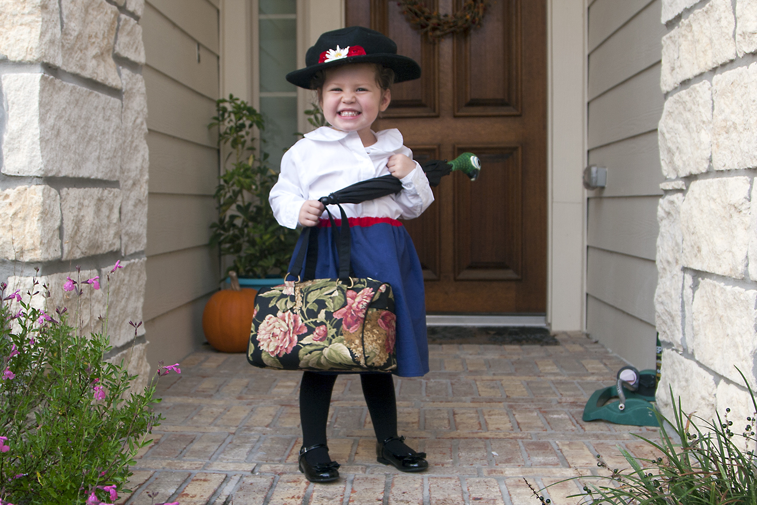 A girl dressed in Mary Poppins costume