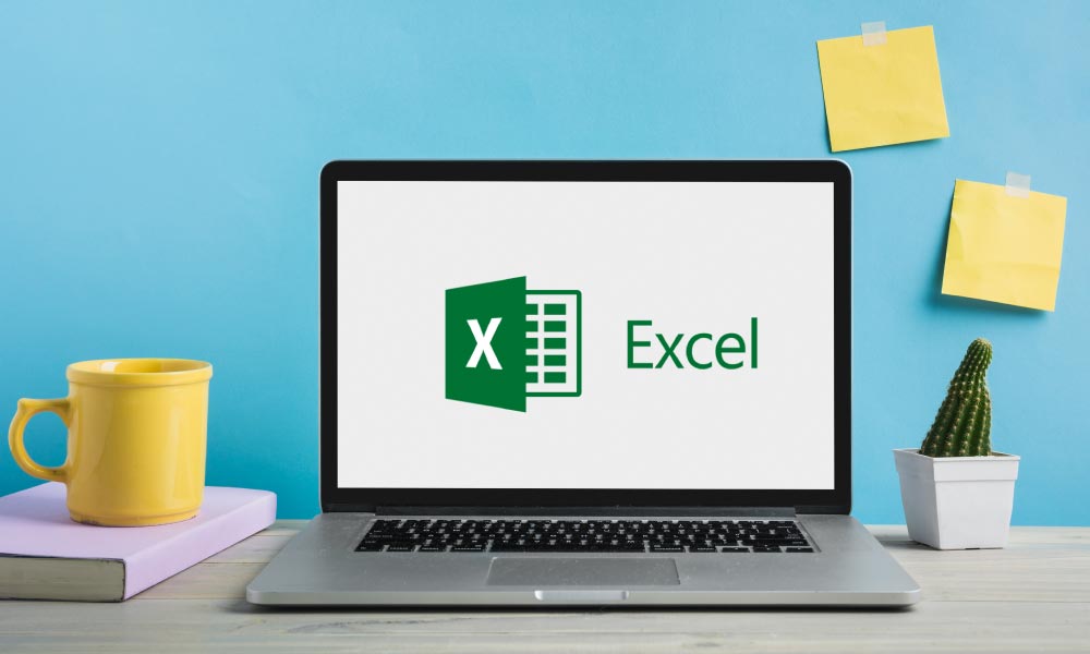  A laptop computer is sitting on top of a desk, with icon of excel on the screen.