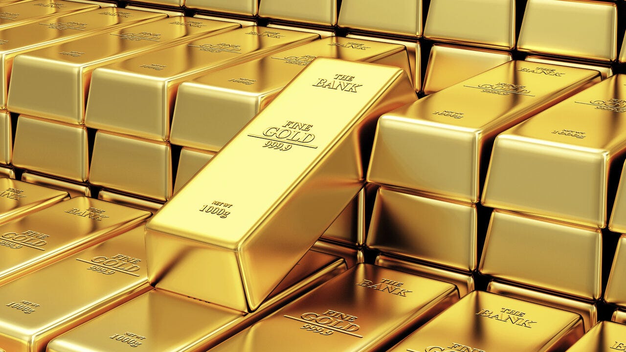 Bars of fine gold stacked on each ither