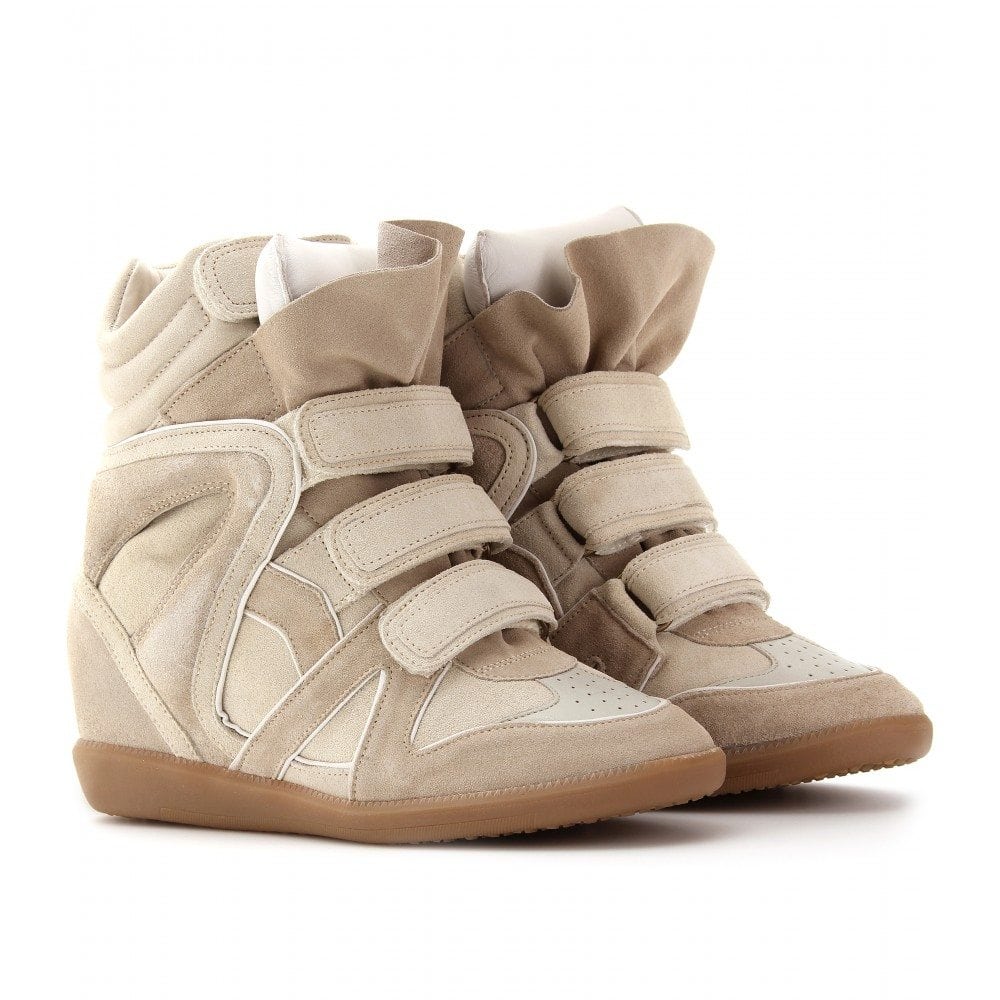 A pair of beige Isabel Marant Beckett wedge sneakers