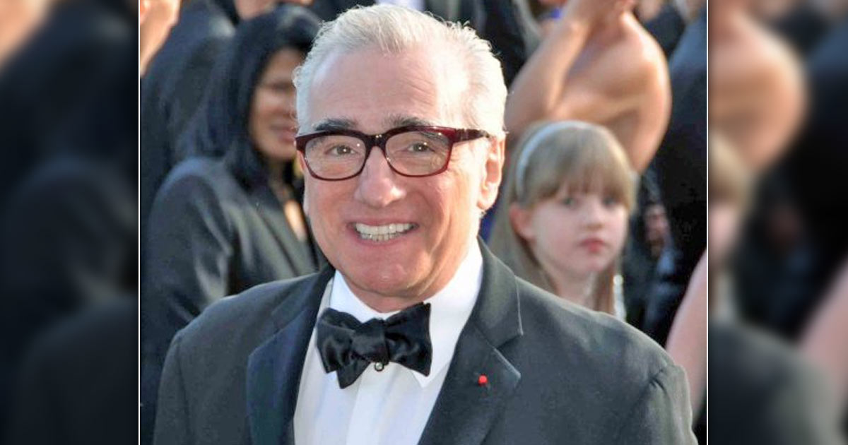 Martin Scorsese wearing a gray suit