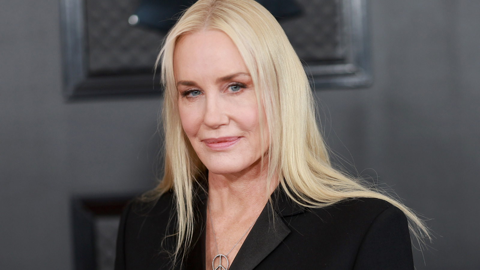 Daryl Hannah wearing a black suit