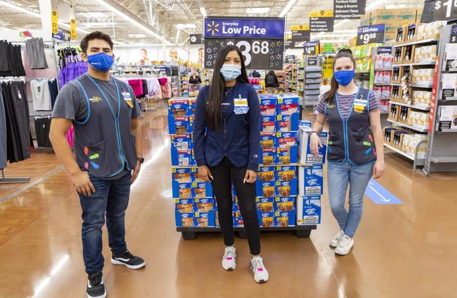 3 Walmart employees posing