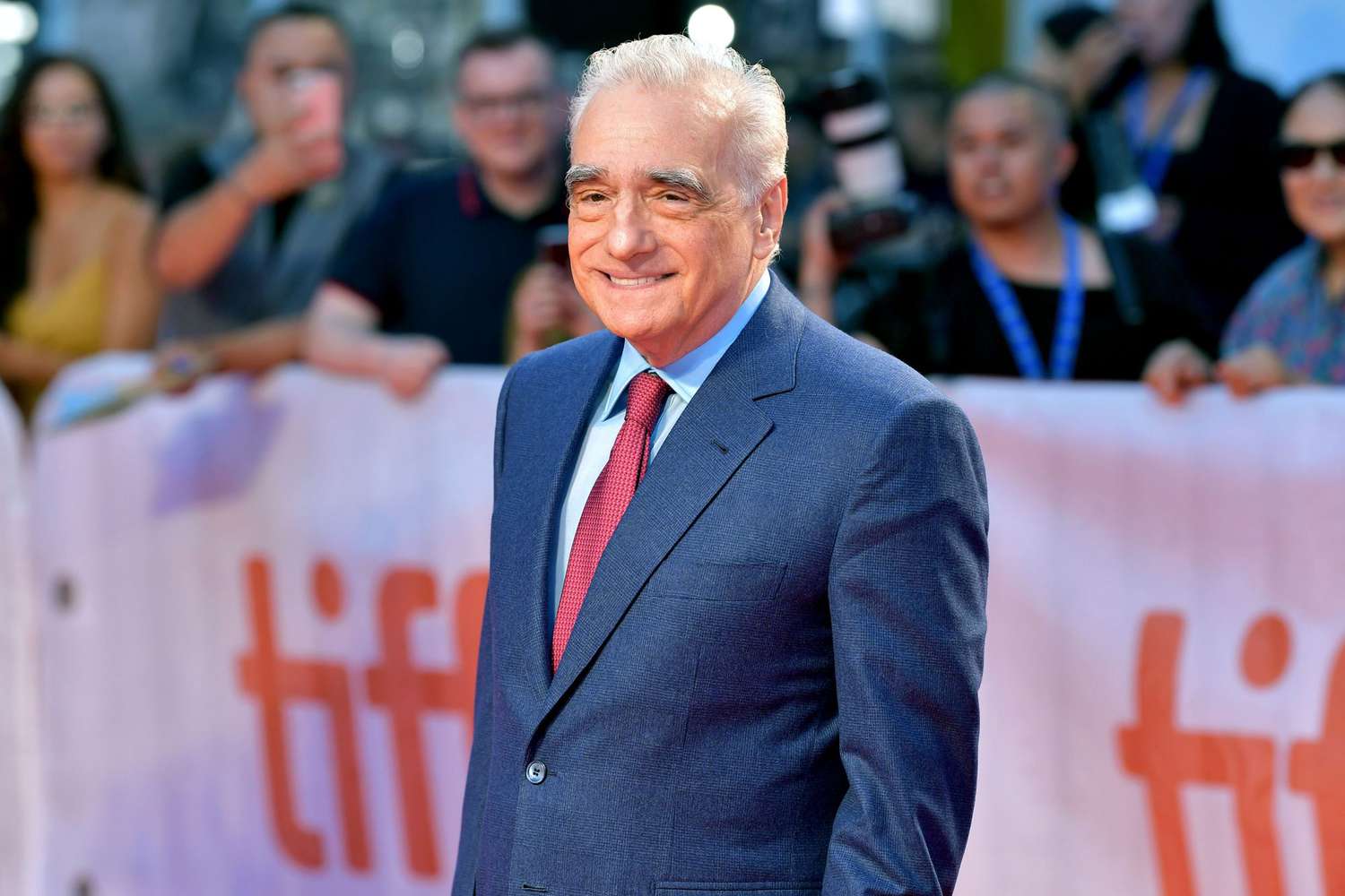 Martin Scorsese wearing a blue suit