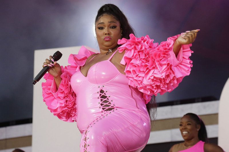 Lizzo wearing a pink outfit
