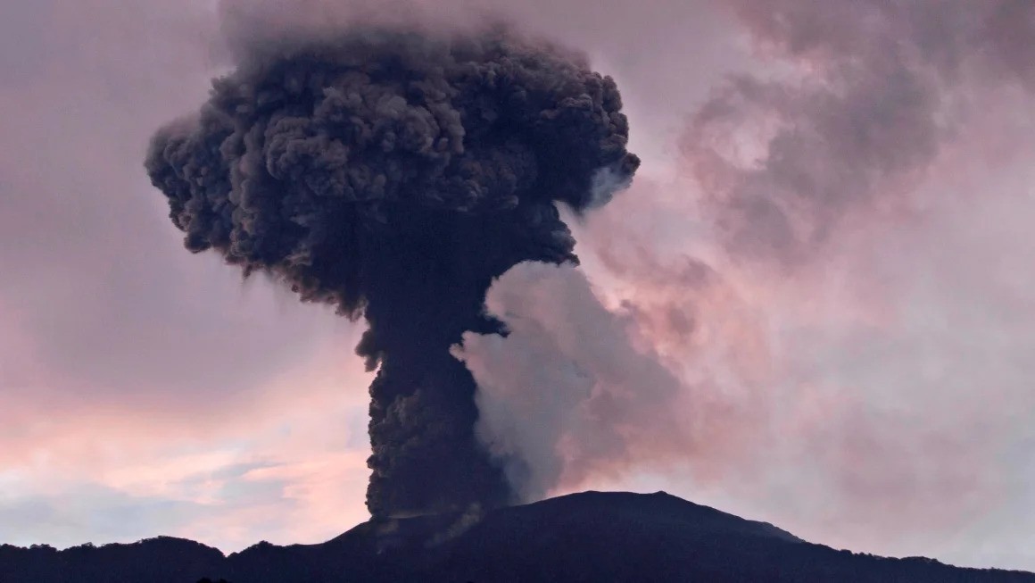 Mount Marapi volcano releasing ash