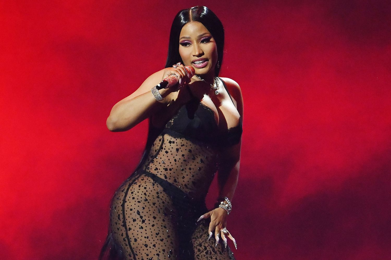 Nicki Minaj wearing a black mesh dress