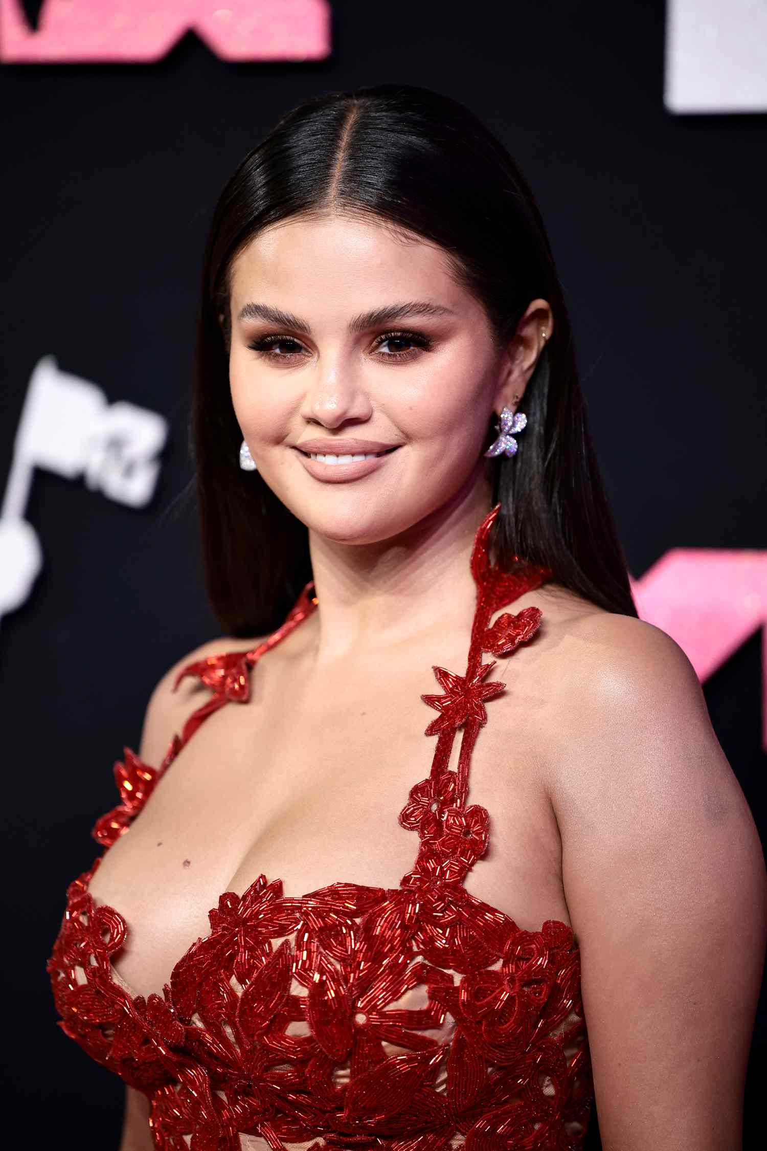 Selena Gomez wearing a red dress
