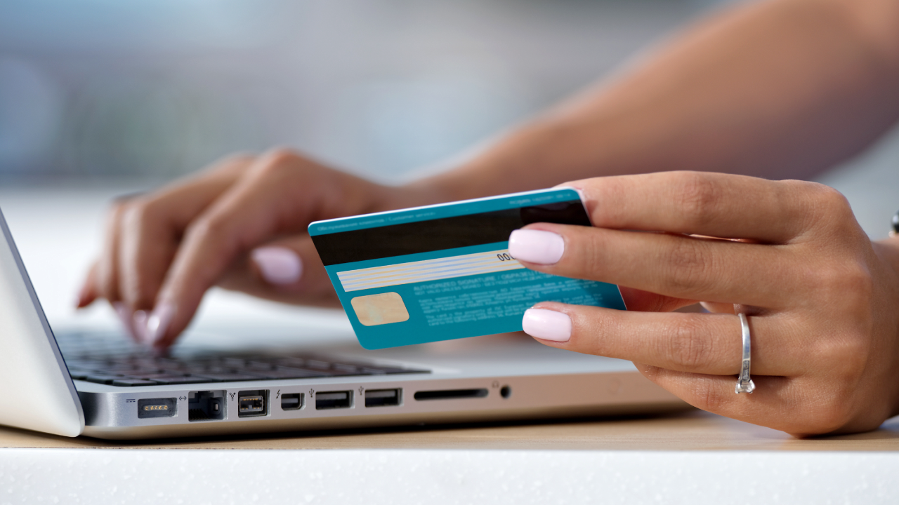 A person making an online payment through a laptop 