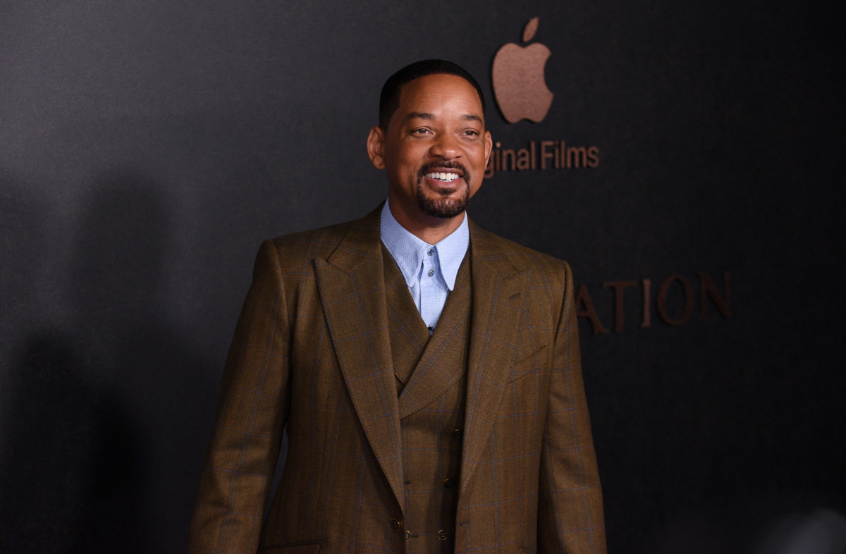 Will Smith wearing a brown suit